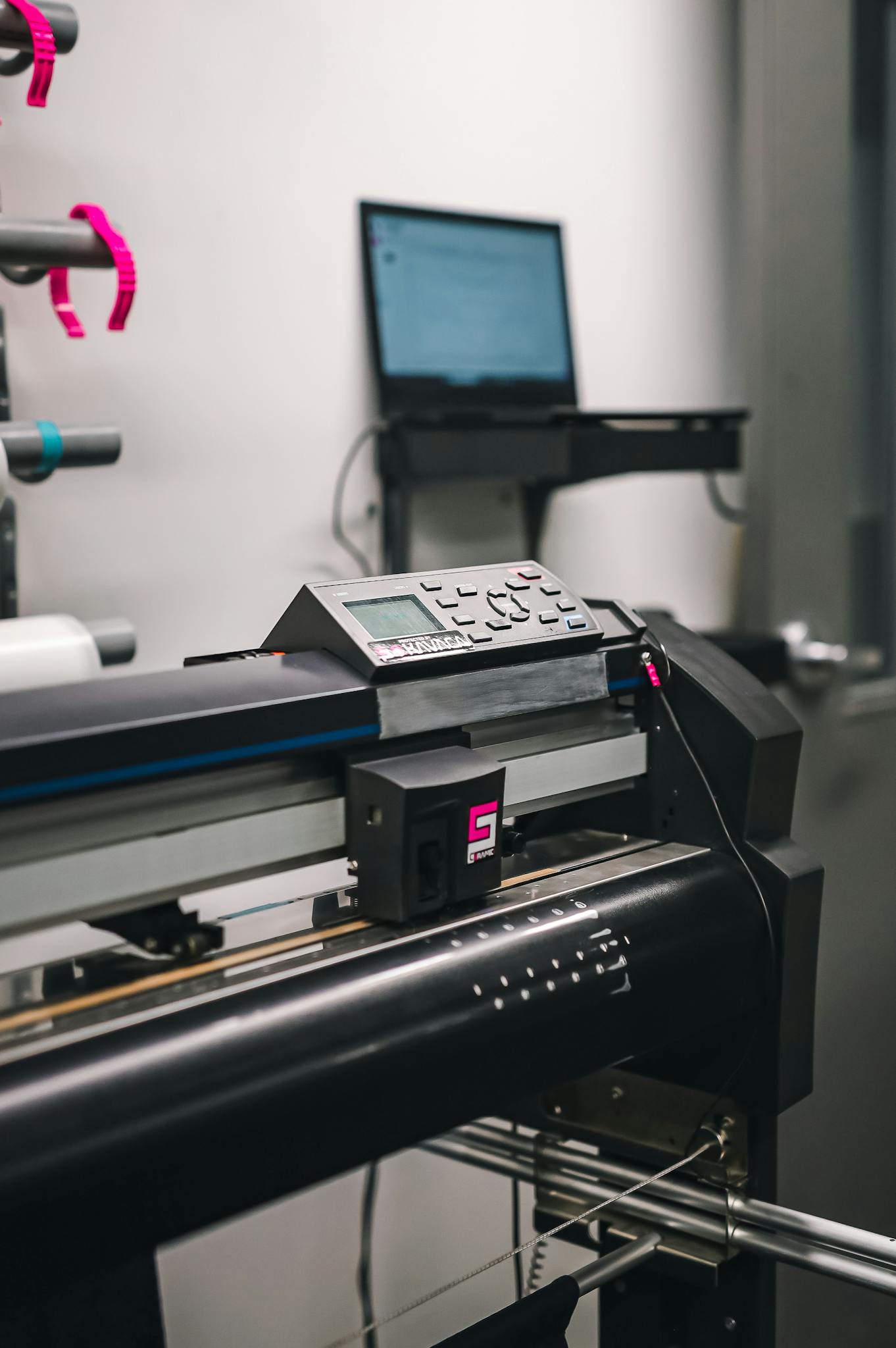Close-up of modern printing machine in a professional studio environment.